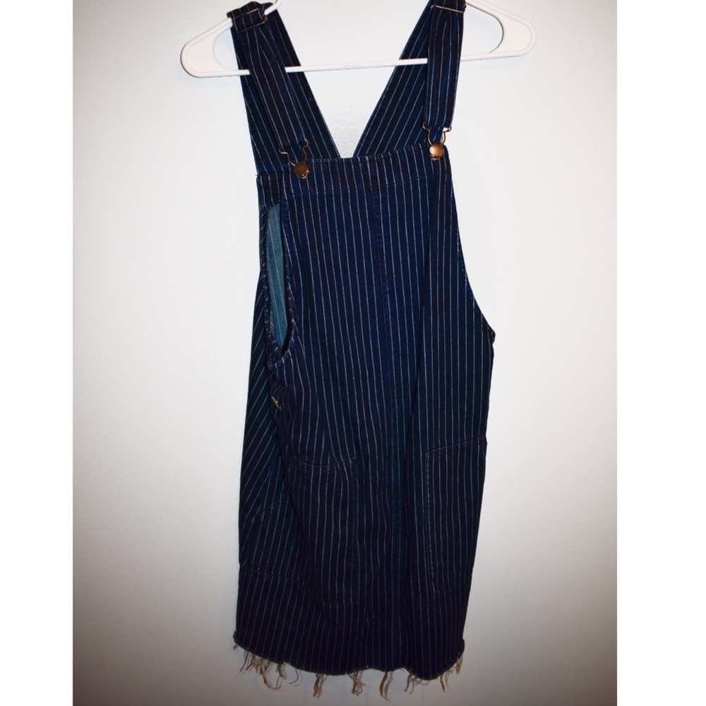 Short striped overall dress.